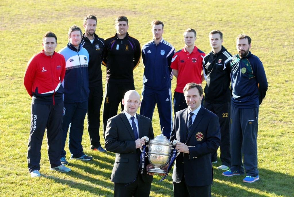Top players from the eight Ulster Bank NCU Premier League sides with the league trophy they hope to win